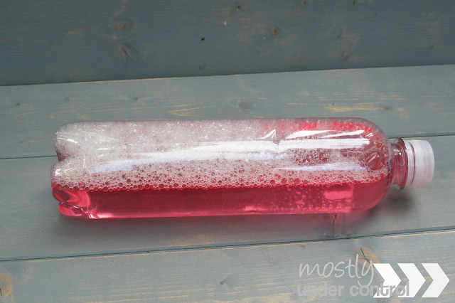 Pink sensory bottle with soapy water