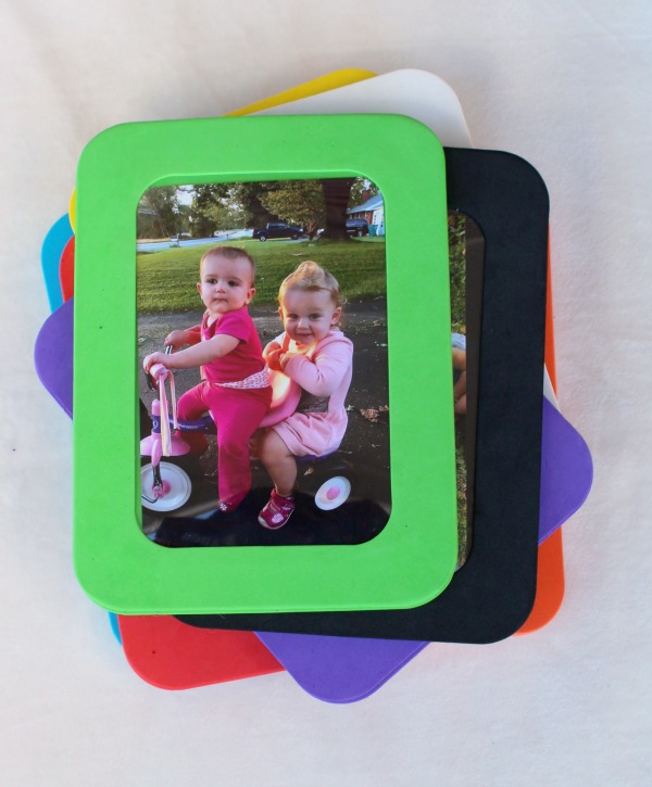 A creative and personalized gift idea for a one year old or a toddler- Family photos framed in colored foam. My toddler LOVES this!