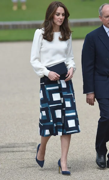 Kate Middleton, Prince William, and Prince Harry attend the official launch of Heads Together. Duchess Catherine wears Banana Republic Geo Jacquard Skirt