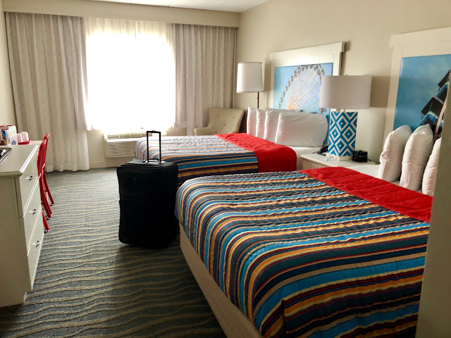 A hotel room with beds and window at Cedar Point in Sandusky, Ohio