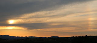 A rainbow accompanies the sunset A rainbow accompanies the sunset
