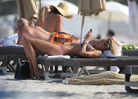 Lauren Stoner in a Bikini relaxing on the beach in Miami