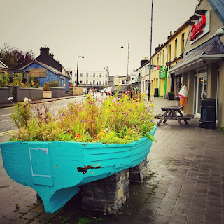 Oughterard in the Fall by Annie Japaud Photography Oughterard, Galway, Ireland, village, road, boat, flowers