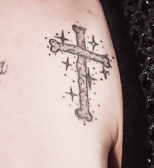 Lil Peep cross tattoo on shoulder