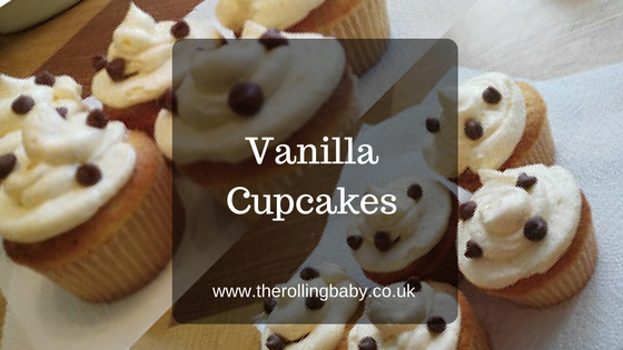 Recipe - Vanilla Cupcakes Cupcakes decorated in white icing with milk chocolate chip decorations