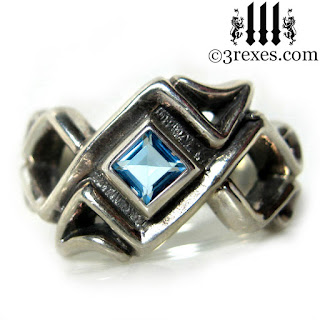 mens celtic knot wedding ring with december blue topaz stone sterling silver