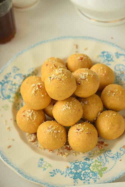 Top view of delicious ghee made Besan Ladoo served in a white blue plate