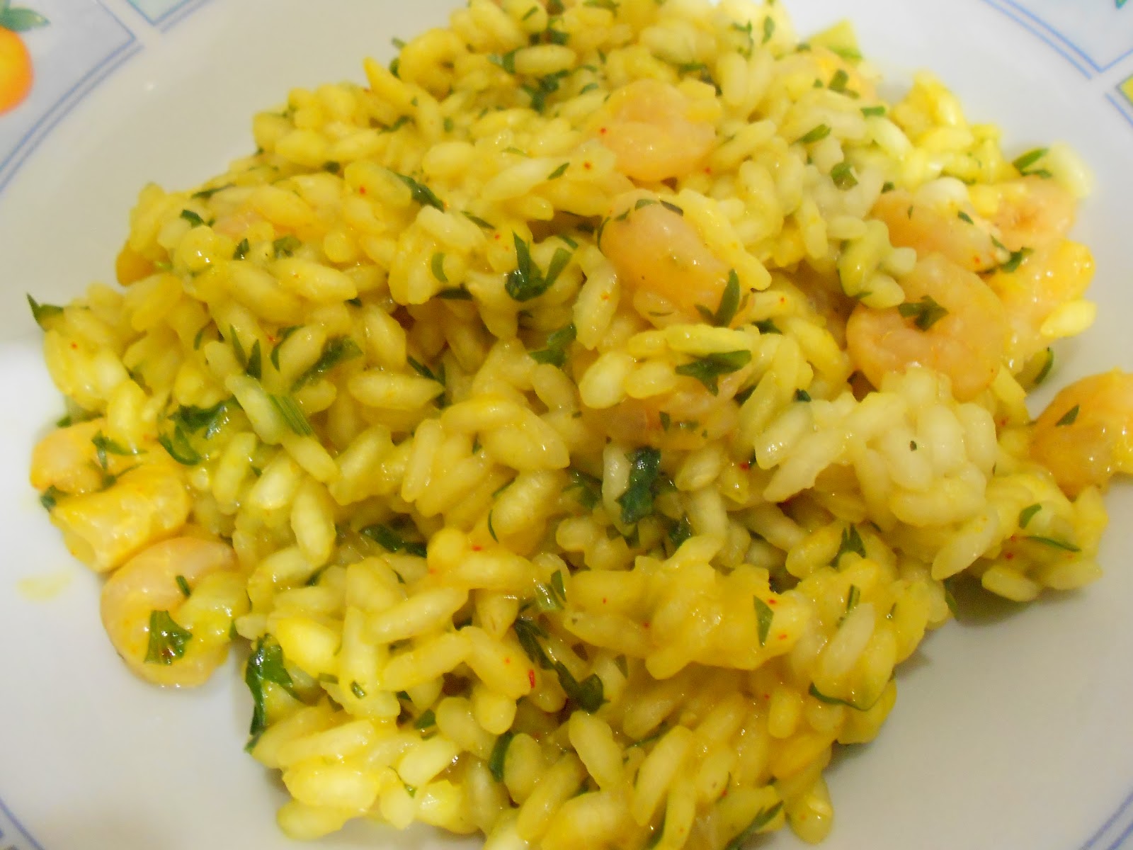 RISO E POMODORO RISOTTO AI GAMBERETTI CIUFFI DI CAROTA E ZAFFERANO