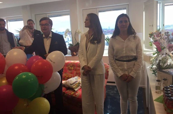 Princess Madeleine of Sweden attended the new office opening of Childhood Foundation in Stockholm. JOSEPH Pink Kimono Sleeve Shirt