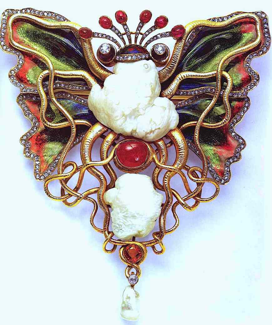 1800s broach 1800s art nouveau gold tenticle broach, a color photograph