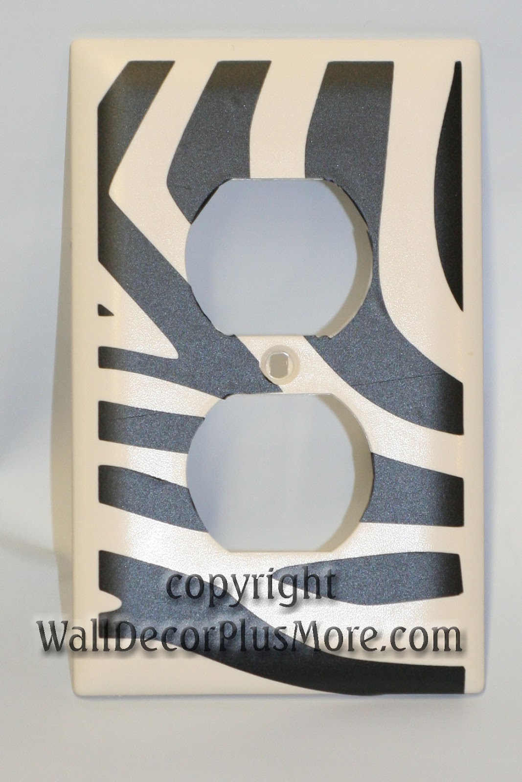 Decorating with Wall Vinyl How to add Wall Vinyl Stickers to outlet covers