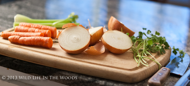 Chopping up vegetables to go in Homemade Chicken Stock.
