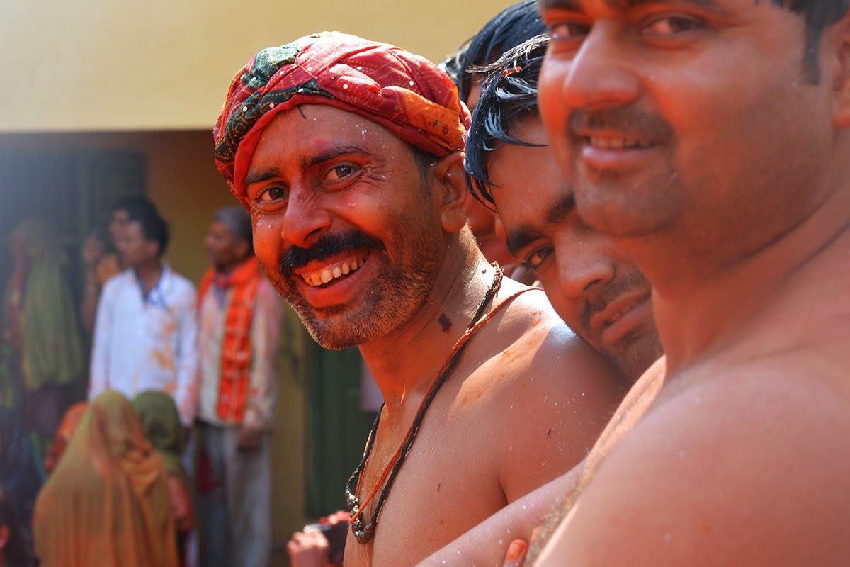 Topless shirtless indian male man Dauji Temple Mathura Holi Huranga 2015 women men playing 