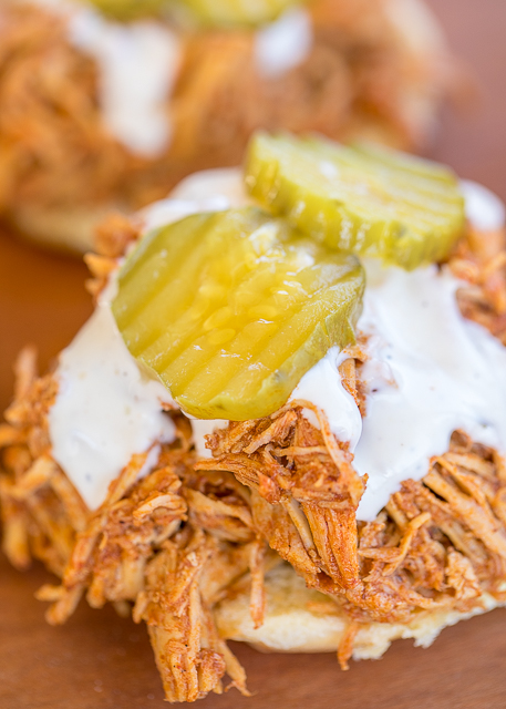 Slow Cooker Nashville Hot Chicken - adapted from the original Hattie B's Hot Chicken recipe in Nashville, TN. SO good!! Chicken, cayenne, brown sugar, garlic powder, paprika, chili powder, butter and chicken broth. Serve the chicken on slider buns with ranch and pickles. SO good! Sweet and spicy in every bite - YUM! #slowcooker #nashvillehotchicken #chickenrecipe #hotchicken Slow Cooker Nashville Hot Chicken - adapted from the original Hattie B's Hot Chicken recipe in Nashville, TN. SO good!! Chicken, cayenne, brown sugar, garlic powder, paprika, chili powder, butter and chicken broth. Serve the chicken on slider buns with ranch and pickles. SO good! Sweet and spicy in every bite - YUM! #slowcooker #nashvillehotchicken #chickenrecipe #hotchicken