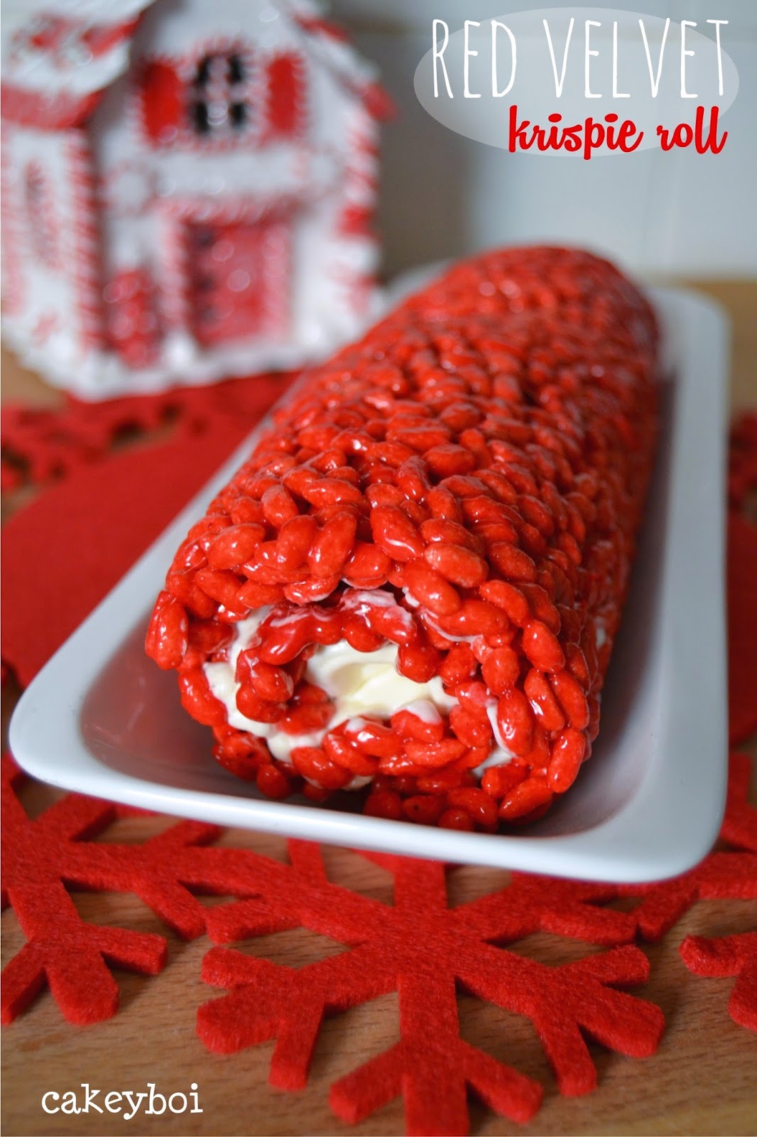 red velvet krispie treats in a festive log shape