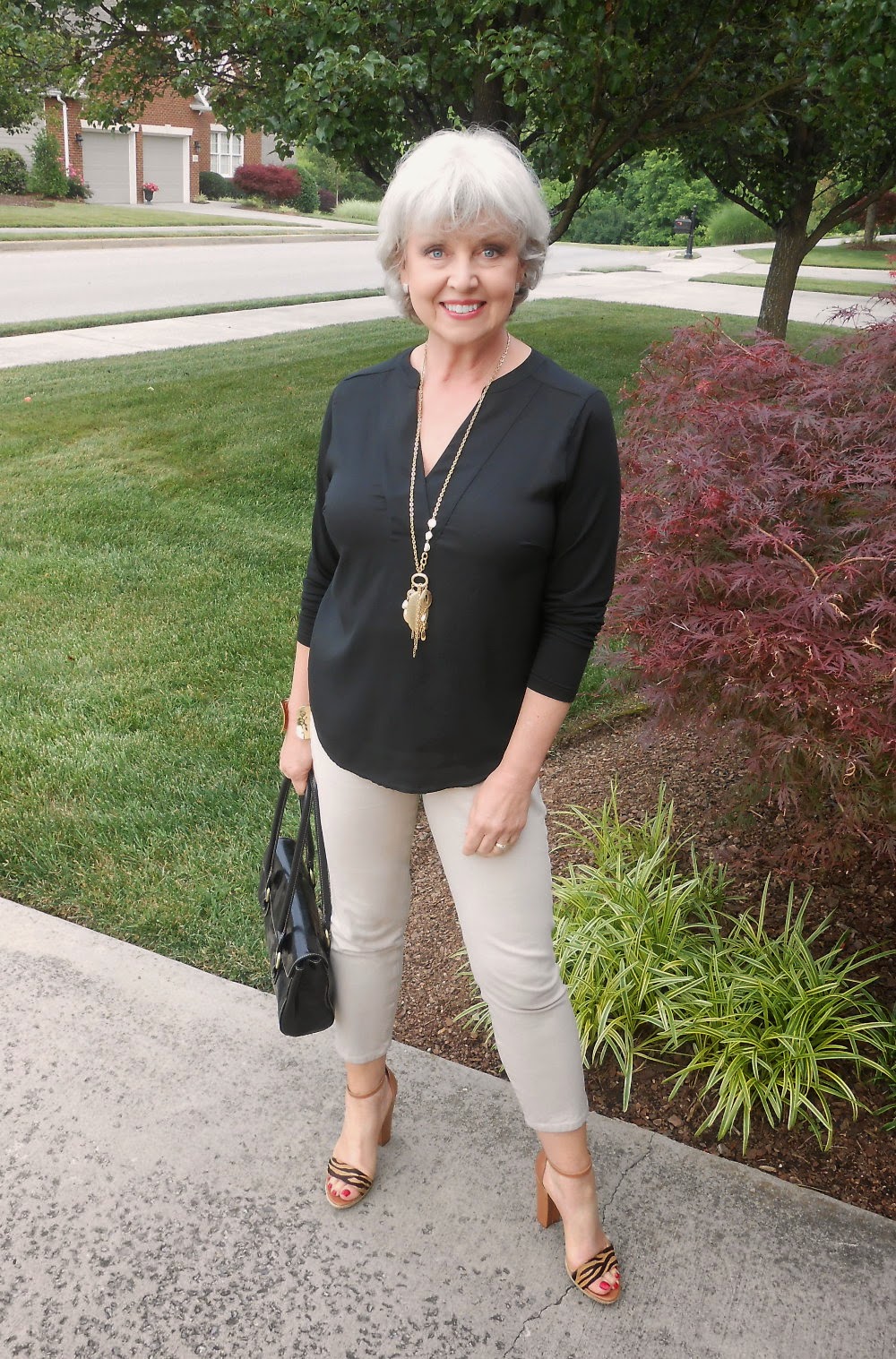 what color tops go with tan pants for women over 50