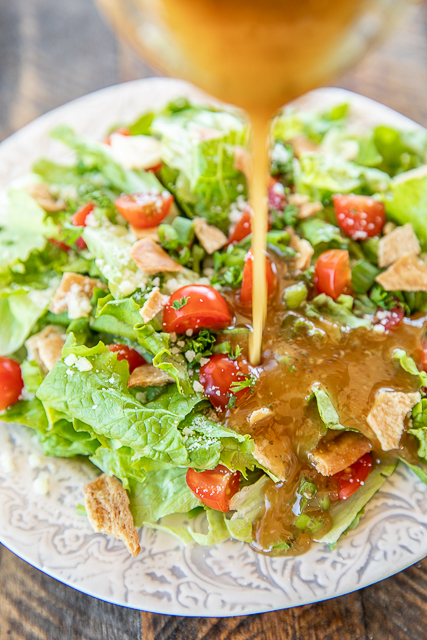 Green Jacket Salad - original recipe from the Green Jacket restaurant in Augusta. SO simple and it tastes great! Lettuce, tomatoes, parsley, green onions, pita chips, olive oil, red wine vinegar, seasoned salt, oregano and parmesan cheese. Goes great with chicken, steak, soup, sandwiches, pizza - anything! Can make in advance and toss together when ready to serve. #salad #masters #vegetables #recipe #sidedish Green Jacket Salad - original recipe from the Green Jacket restaurant in Augusta. SO simple and it tastes great! Lettuce, tomatoes, parsley, green onions, pita chips, olive oil, red wine vinegar, seasoned salt, oregano and parmesan cheese. Goes great with chicken, steak, soup, sandwiches, pizza - anything! Can make in advance and toss together when ready to serve. #salad #masters #vegetables #recipe #sidedish