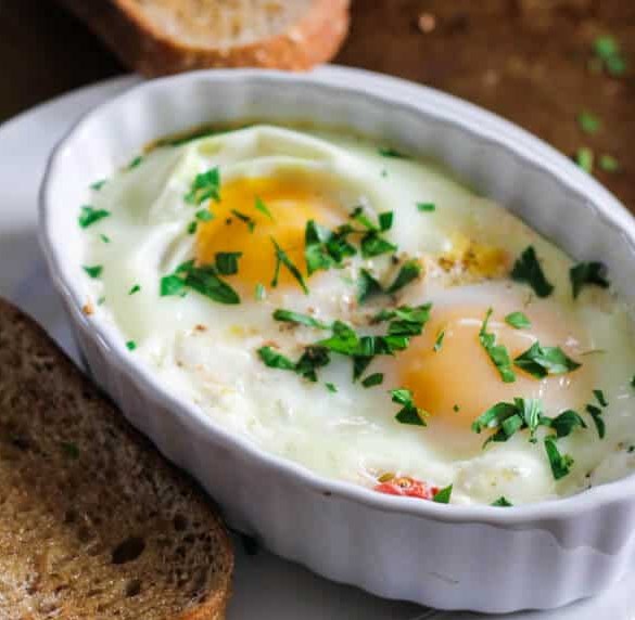 BAKED EGGS WITH TOMATOES AND FETA CHEESE