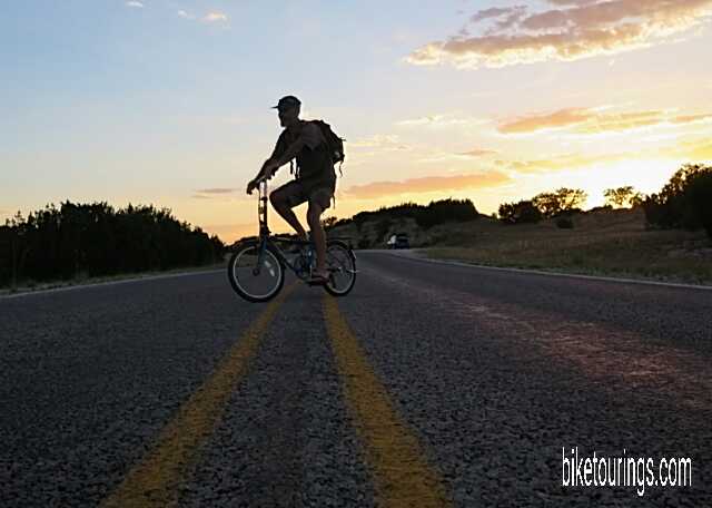 Riding Dahon Mariner on quiet country roads Picture of author riding Dahon Mariner folding bike on country road.