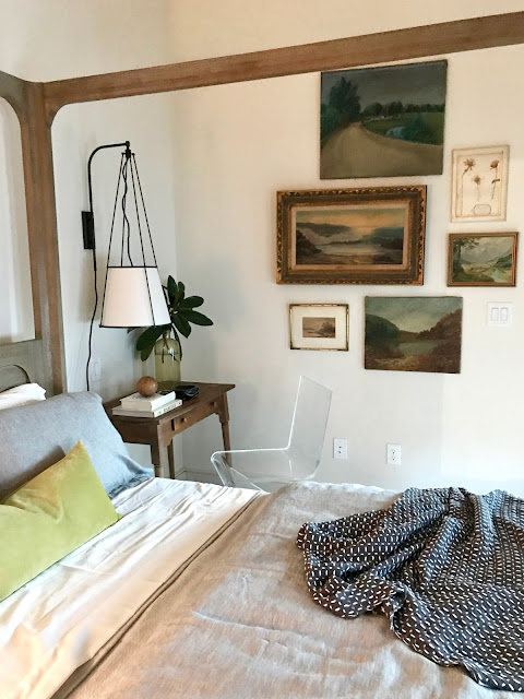 A gorgeous bedroom with Restoration Hardware bed and a charming vintage gallery of art on the wall. Design: Julie Holloway. Photo: Sherry Hart. #bedroomdcor #restorationhardware #modernrustic #rusticmodern #rusticbedroom #interiordesign