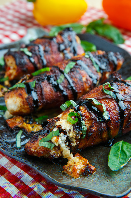 Bacon Wrapped Roasted Red Pepper and Goat Cheese Stuffed Chicken with Balsamic Drizzle and Basil Bacon Wrapped Roasted Red Pepper and Goat Cheese Stuffed Chicken with Balsamic Drizzle and Basil