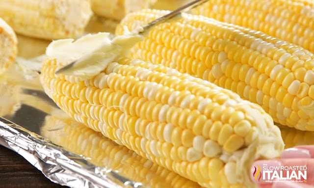Corn on the Cob in the Oven Oven Corn on the Cob: Buttering the corn