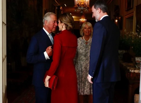 Queen Letizia visited the Palace of Westminster, British Parliament. Prince Charles and Duchess Camilla at Clarence House. Nina Ricci dress. Prada Pumps