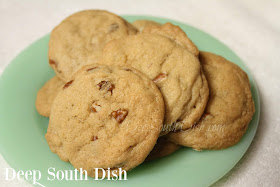 Pecan Crispies A crisp cookie, made with butter and shortening, brown sugar and pecans.