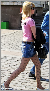 Girl in sunglasses on the street  