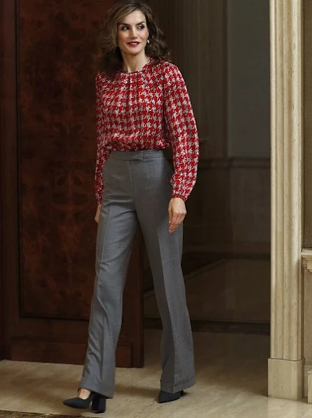 Queen Letizia wore Carolina Herrera blouse, UTERQUE High heel fabric shoes, Hugo Boss Trousers