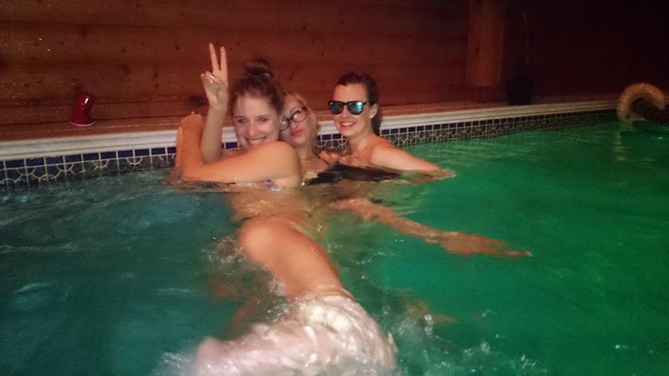 girls at an indoor pool party in london