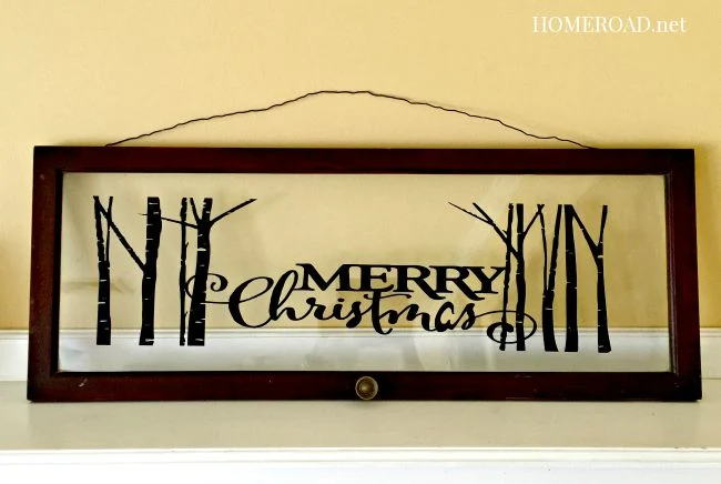 Merry Christmas vinyl applied to inside of vintage window