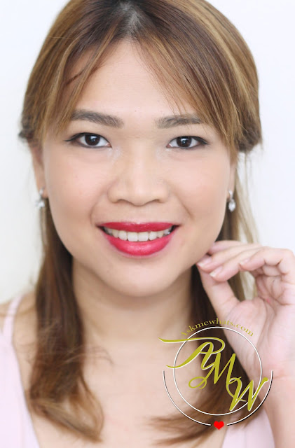 a photo of askmewhats wearing L'Oreal Infallible Pro Matte Gloss