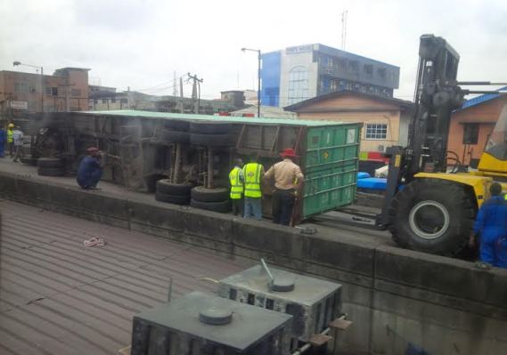 0 Photos: Another container falls on Ojuelegba bridge