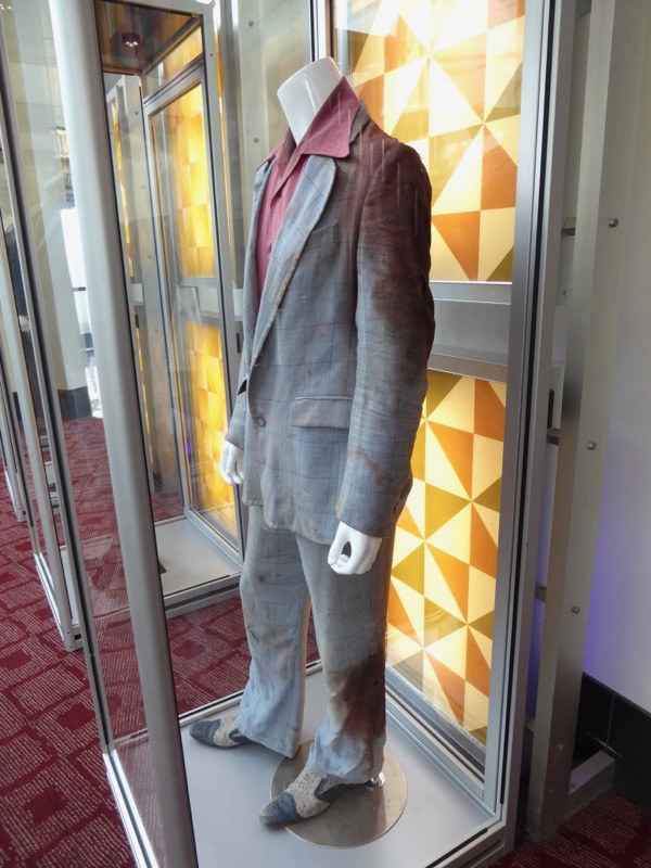 Hollywood Movie Costumes and Props Free Fire movie costumes on display