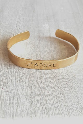 http://www.whitetrufflestudio.com/collections/mother-s-day-collection/products/j-adore-stamped-cuff-bracelet