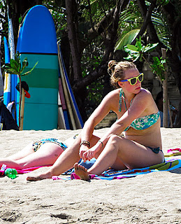 Australian beach beauties getting some sun tan