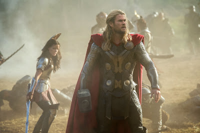 Jamie Alexander and Chris Hemsworth in Thor: The Dark World
