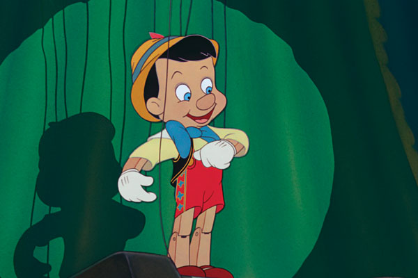 The boy on strings in Pinocchio 1940 animatedfilmreviews.filminspector.com