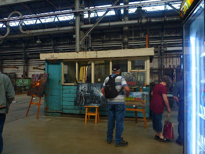 Exhibition of oil paintings of blacksmith's workshop, Eveleigh Railway Workshops painted during ATP Open Day by industrial heritage artist Jane Bennett