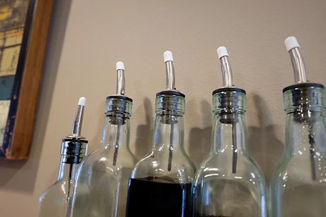 wire shelf caps for lids on pour bottles