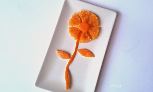 naranja preparada en forma de flor