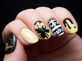 Freehand bee nail art by @chalkboardnails