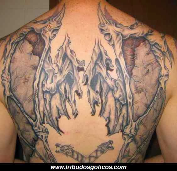 assa tipo demonio mais toda machucadas e rasgadas tatoo,costa,completa,asas,anjo,machucada