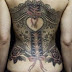 Corset tattoo on full back