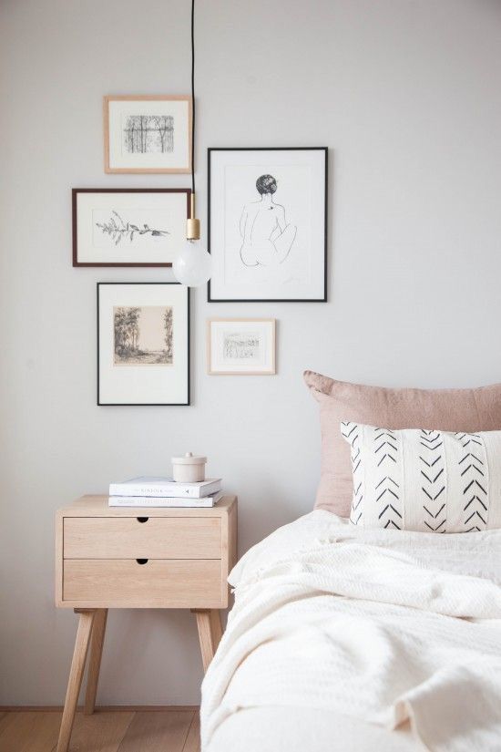 minimalist blush bedroom decor with Scandinavian art