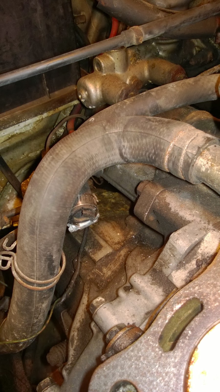 Saving Honda Step 4. Remove alternator and coolant hoses