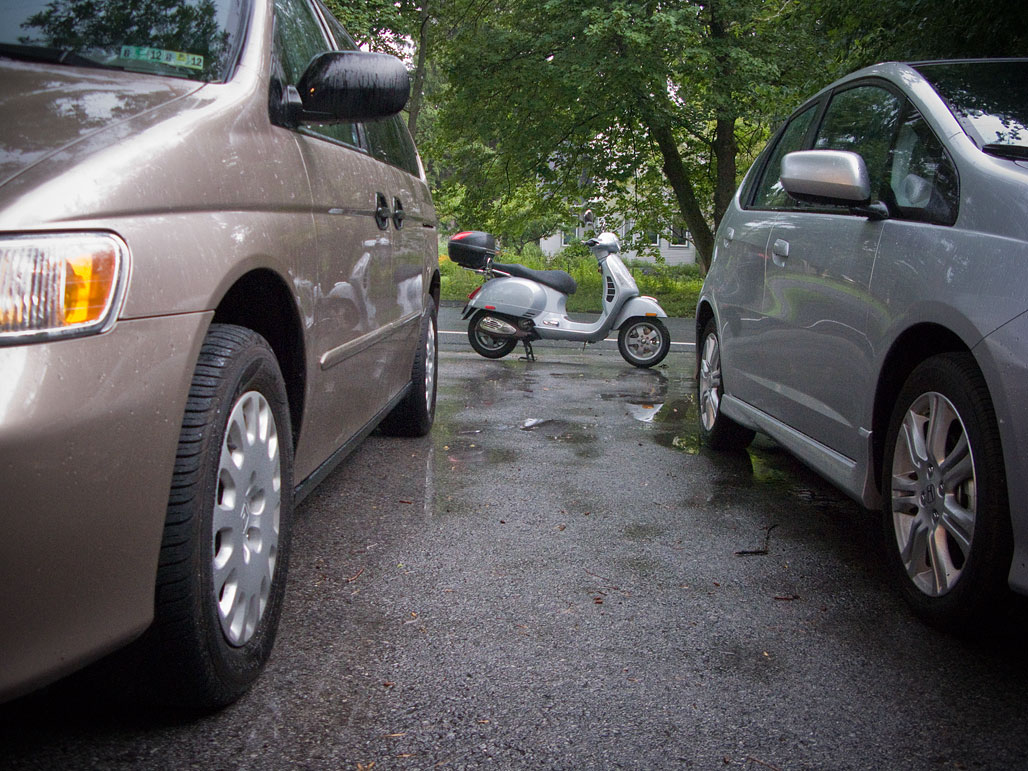 Riding a Vespa in the Rain vespa