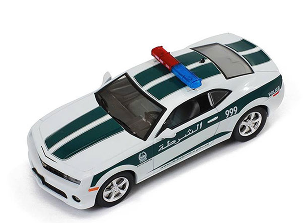 Зеленая полицейская машина. Chevrolet Camaro IXO. Шевроле Камаро Полицейская машинка. Масштабная модель Шевроле Камаро модель.