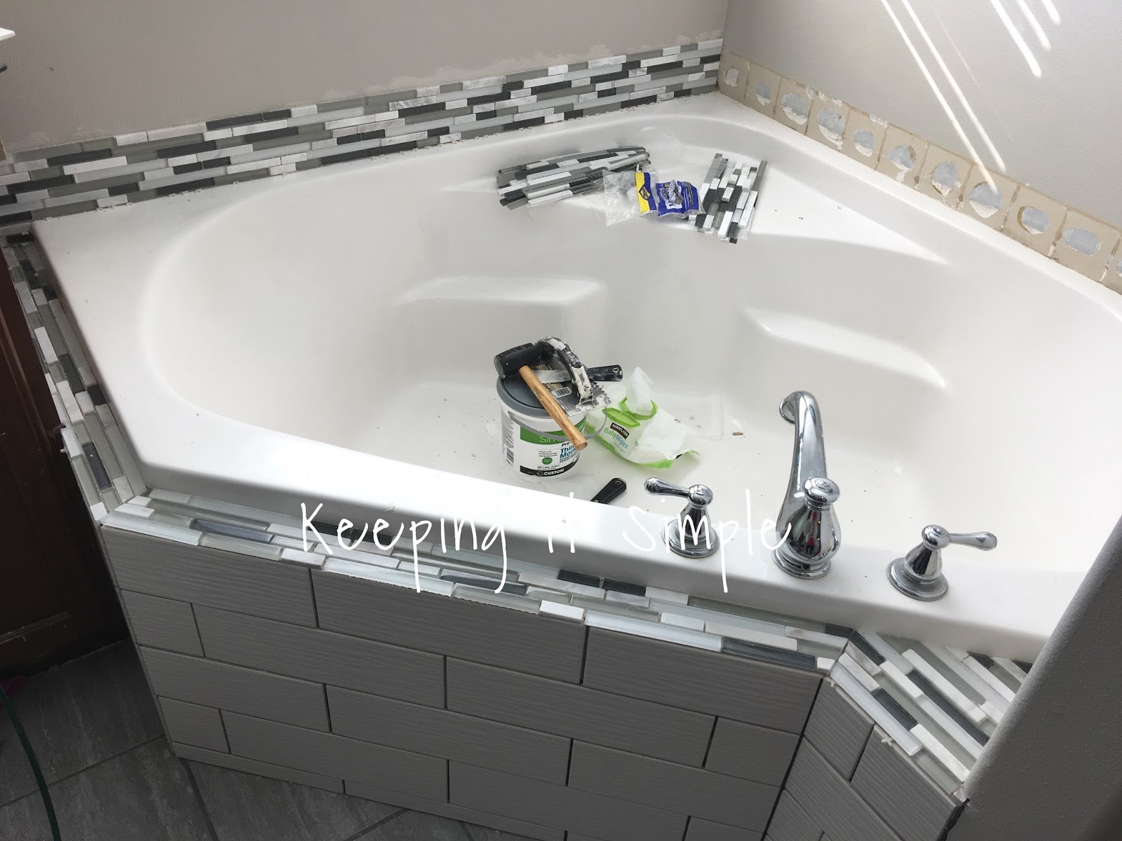 Tips on How to Tile a Corner Bathtub using Wavecrest and Venatino Linear Mosaic Tiles Keeping